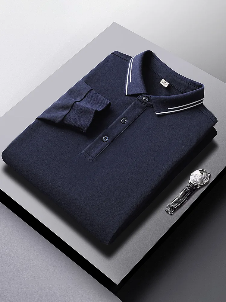 Navy long sleeve polo shirt neatly folded for packing